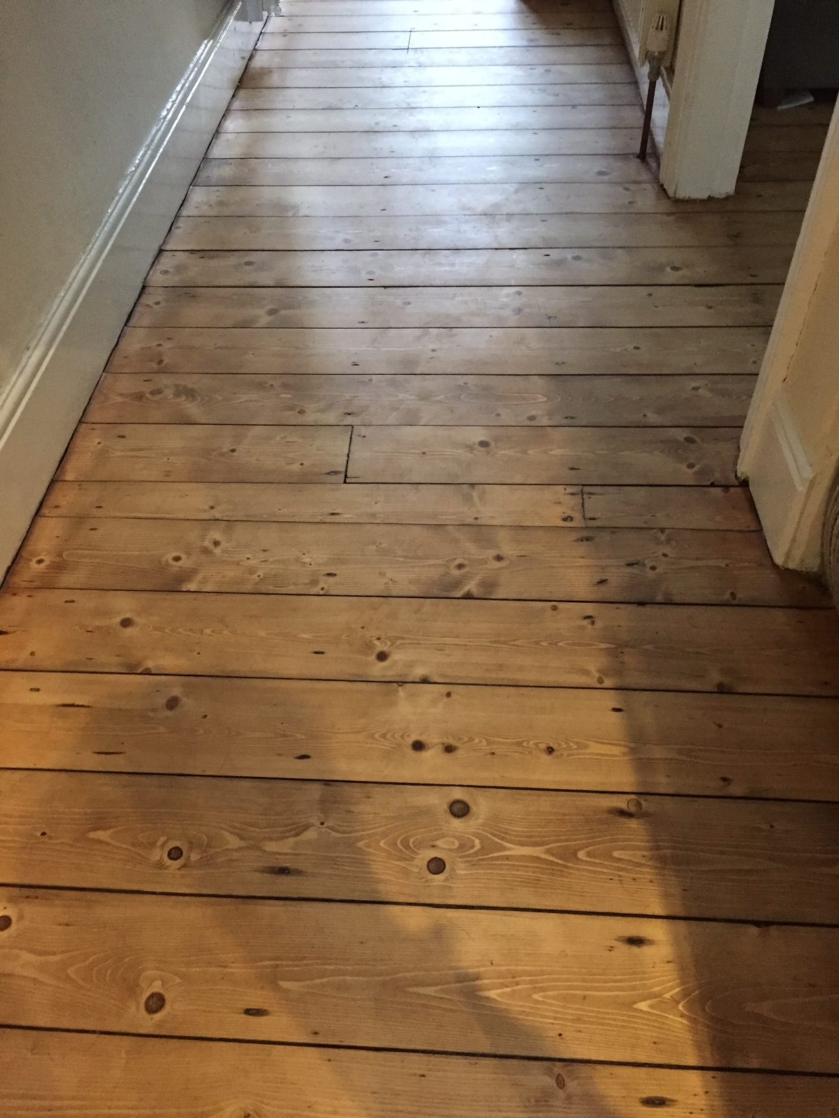 Pine hallway after. Stained Victorian pine and lacquered